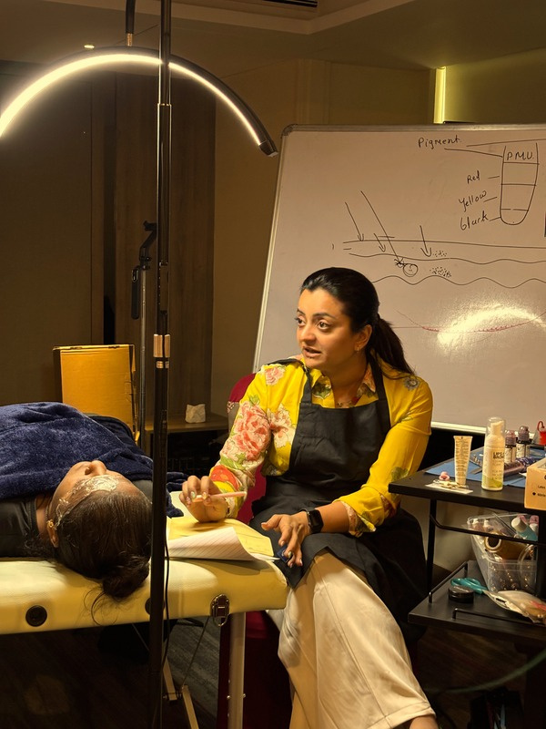 Bhavini Rathod teaching a permanent makeup class